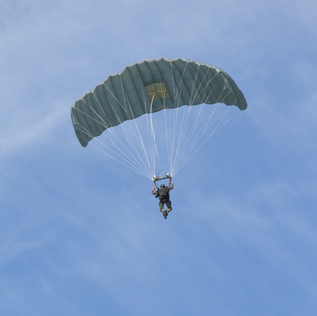 LEEUWARDEN,FRIESLAND,HOLLAND-SEPTEMBER 17  Two parachutists of the dutch army at the Airshow on September 17, 2011 at Leeuwarden Airfieldのeditorial素材