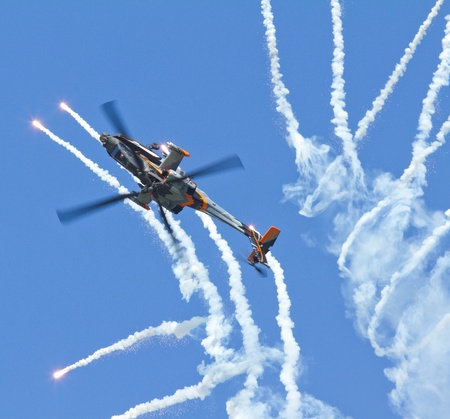 LEEUWARDEN,FRIESLAND,HOLLAND-SEPTEMBER 17:: Apache AH-64D Solo Display Team shoots flares at the...