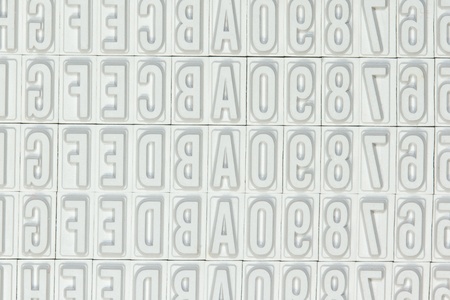 A close-up of several letters used for a stamp