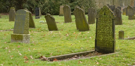 Tombstones on an old graveyard in Hollandのeditorial素材