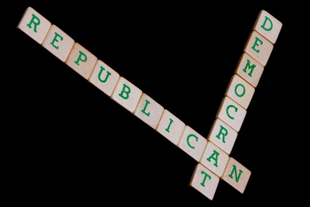 Democrat and republican spelled in a crossword on a black backgroundの写真素材