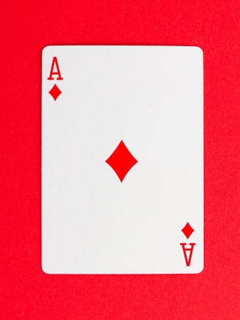 Playing card (ace) isolated on a red backgroundのeditorial素材