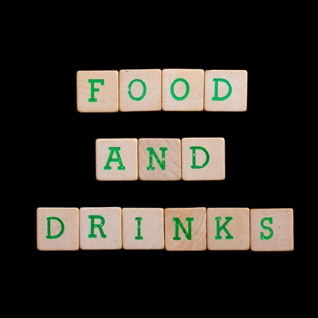 Letters on old wooden blocks (food and drinks)の写真素材