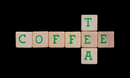 Green letters on old wooden blocks (coffee, tea)の写真素材