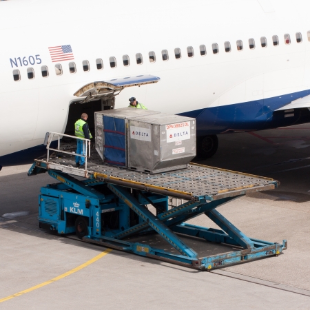 AMSTERDAM - MAY 11: Boeing 767-332ER of Delta is being loaded by ground personal before taking off...