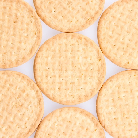 A few round biscuits on a grey backgroundの写真素材