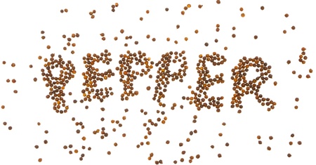 Black pepper spelled out on a white backgroundの写真素材