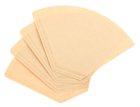 Four coffee filters isolated on a white backgroundの写真素材