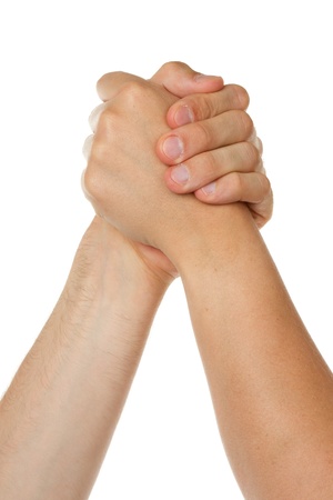 Man and woman in arm wrestlin, white backgroundの写真素材