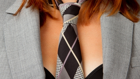 Close-up of a caucasian business woman with a tieの写真素材