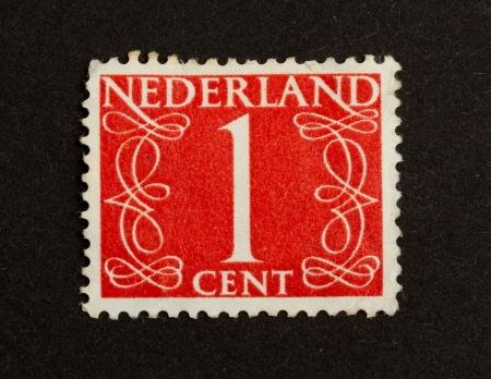 THE NETHERLANDS - CIRCA 1950: Stamp printed in the Netherlands shows the number 1, circa 1950のeditorial素材