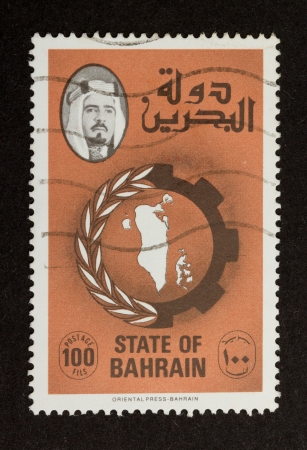 STATE OF BAHRAIN - CIRCA 1980: Stamp printed in the state of Bahrain shows a a map op the land, circa 1980のeditorial素材