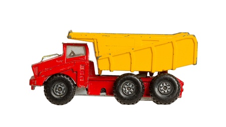 Old toy car (1970) isolated on a white backgroundの写真素材