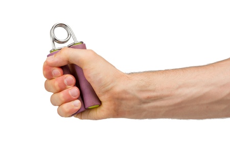 Man holding a purple hand trainer isolated on whiteの写真素材