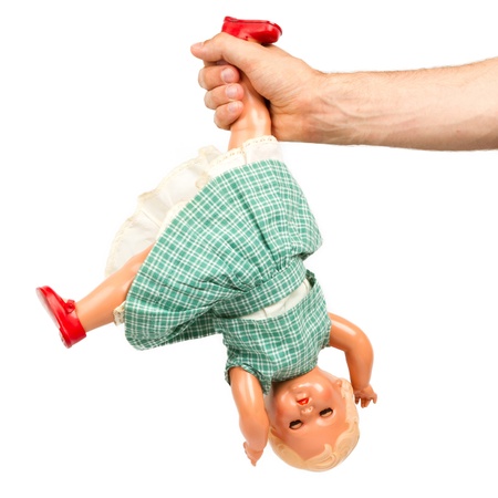 Very old baby doll (1940s), made with authentic clothing, isolatedの写真素材