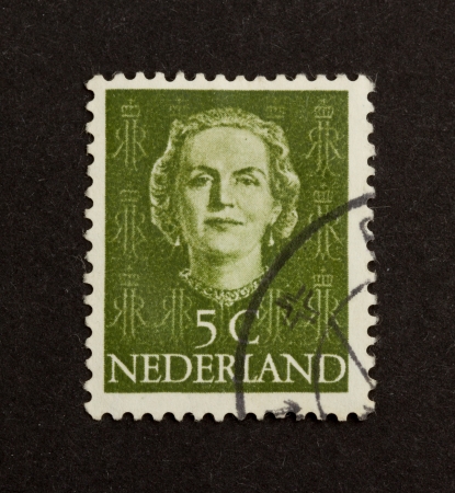 HOLLAND - CIRCA 1970: Stamp printed in the Netherlands shows the head of state, circa 1970の写真素材
