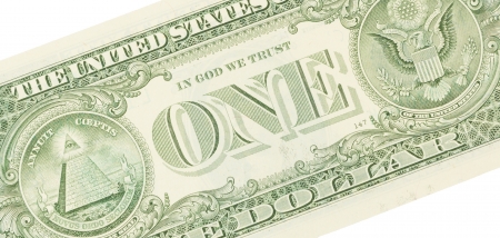 Close-up of an one dollar bills, isolated on whiteの写真素材