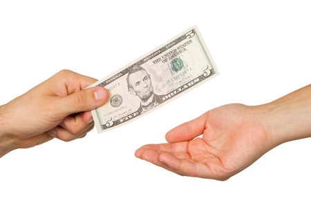 Transfer of money between man and woman, isolated on whiteの写真素材