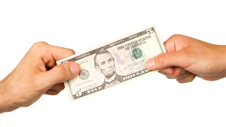 Transfer of money between man and woman, isolated on white