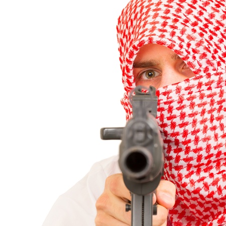 Arab adult with a machine gun, terrorist, isolated on whiteの写真素材