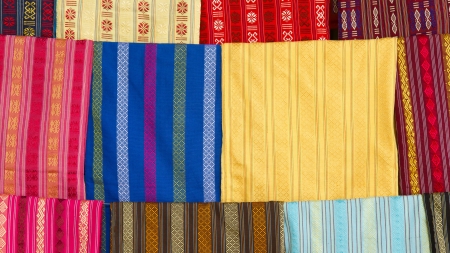 Silk scarfs on display in a silk factory in Vietnam