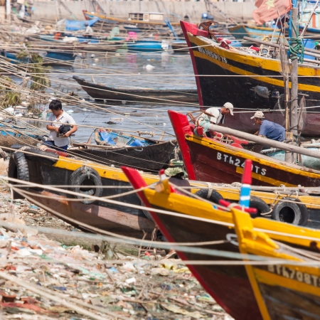 Fishing boats in a harbour in Vietnamのeditorial素材