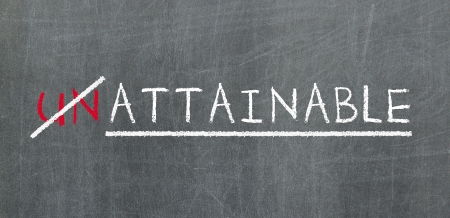 Unattainable and attainable sign, written on blackboardの写真素材