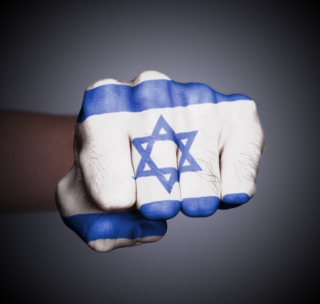 Front view of punching fist on gray background, flag of Israelの写真素材