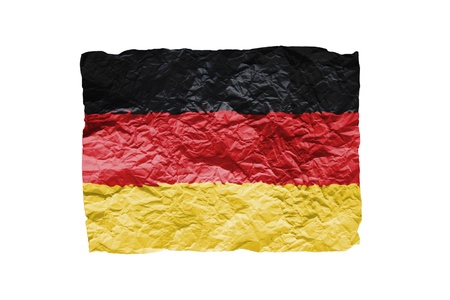Close up of a curled paper on white background, print of the flag of Germanyの写真素材