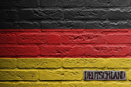 Brick wall with a painting of a flag isolated, Germanyの写真素材