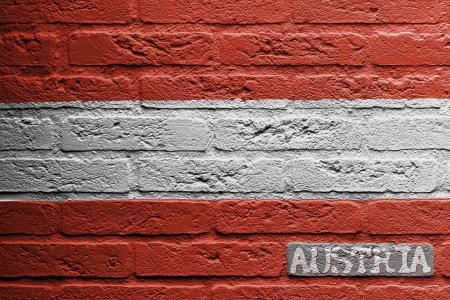 Brick wall with a painting of a flag isolated, Austriaの写真素材