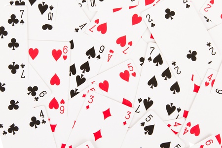 Large collection of used playing cards, closeup