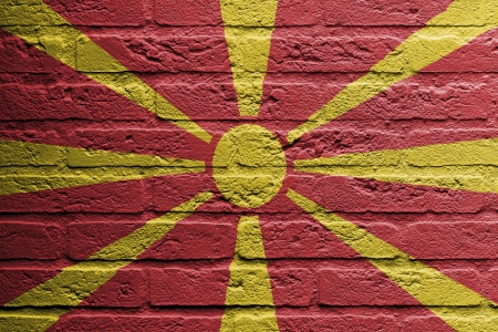 Brick wall with a painting of a flag isolated, Macedoniaの写真素材