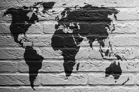Brick wall with a painting of a flag isolated, World Mapの写真素材