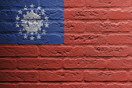 Brick wall with a painting of a flag isolated, Myanmarの写真素材