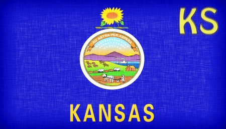 Linen flag of the US state of Kansas with it's abbreviation stitched on itの写真素材