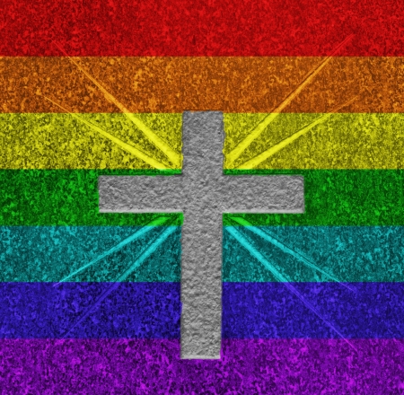 Decoration on an old grave in the colors of the rainbow flagの写真素材
