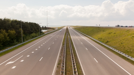View of the dutch Afsluitdijk in Holland, seperating the Waddensea from the Ijsselmeerの写真素材