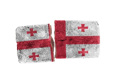 Rough broken brick, isolated on white background, flag of Georgiaの写真素材