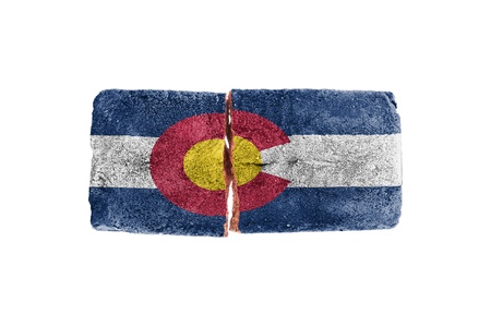 Rough broken brick, isolated on white background, flag of Coloradoの写真素材