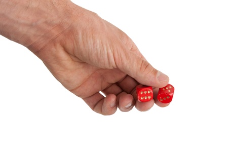 Hand holding red dices, isolated on whiteの写真素材