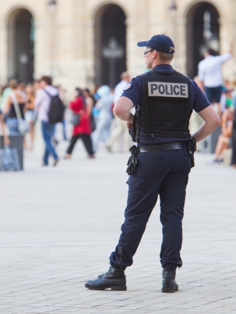 PARIS, FRANCE - July 28 2013: French police control the street at the Louvre during one of the busiest days of the year, Paris the 28 of July 2013, Franceのeditorial素材