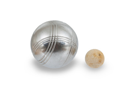 Game of jeu de boule, silver metal ball close to the small wooden ball. A french ball gameの写真素材