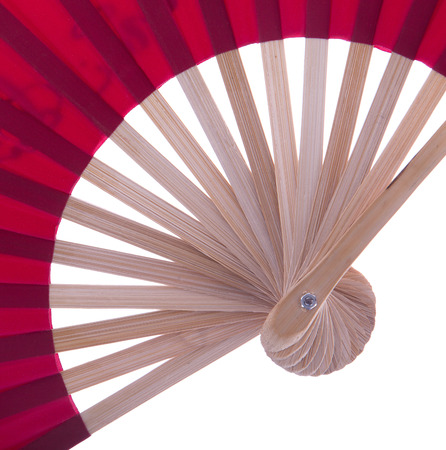 Red fan isolated on white backgroundの写真素材