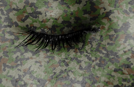 Crying woman, pain and grief concept, camouflageの写真素材