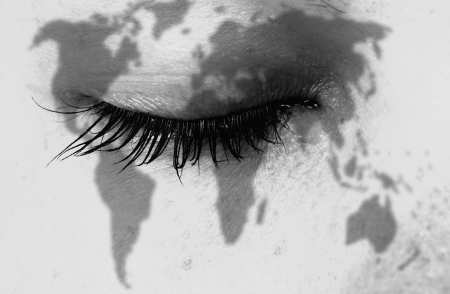 Crying woman, pain and grief concept, world map