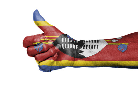 Old woman giving the thumbs up sign, isolated, flag of Swazilandの写真素材