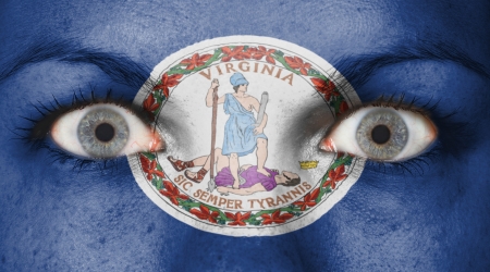 Close up of eyes. Painted face with flag of Virginiaの写真素材