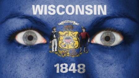 Close up of eyes. Painted face with flag of Wisconsinの写真素材