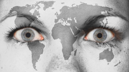 Close up of eyes. Painted face with world mapの写真素材